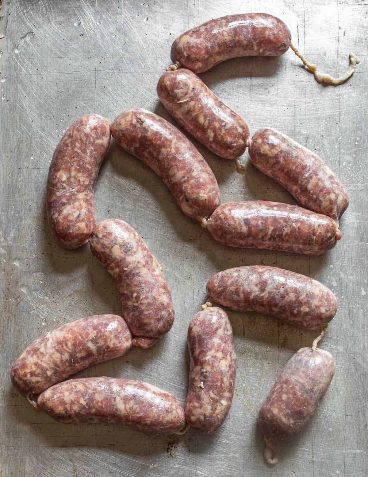 venison Italian sausage on a baking sheet