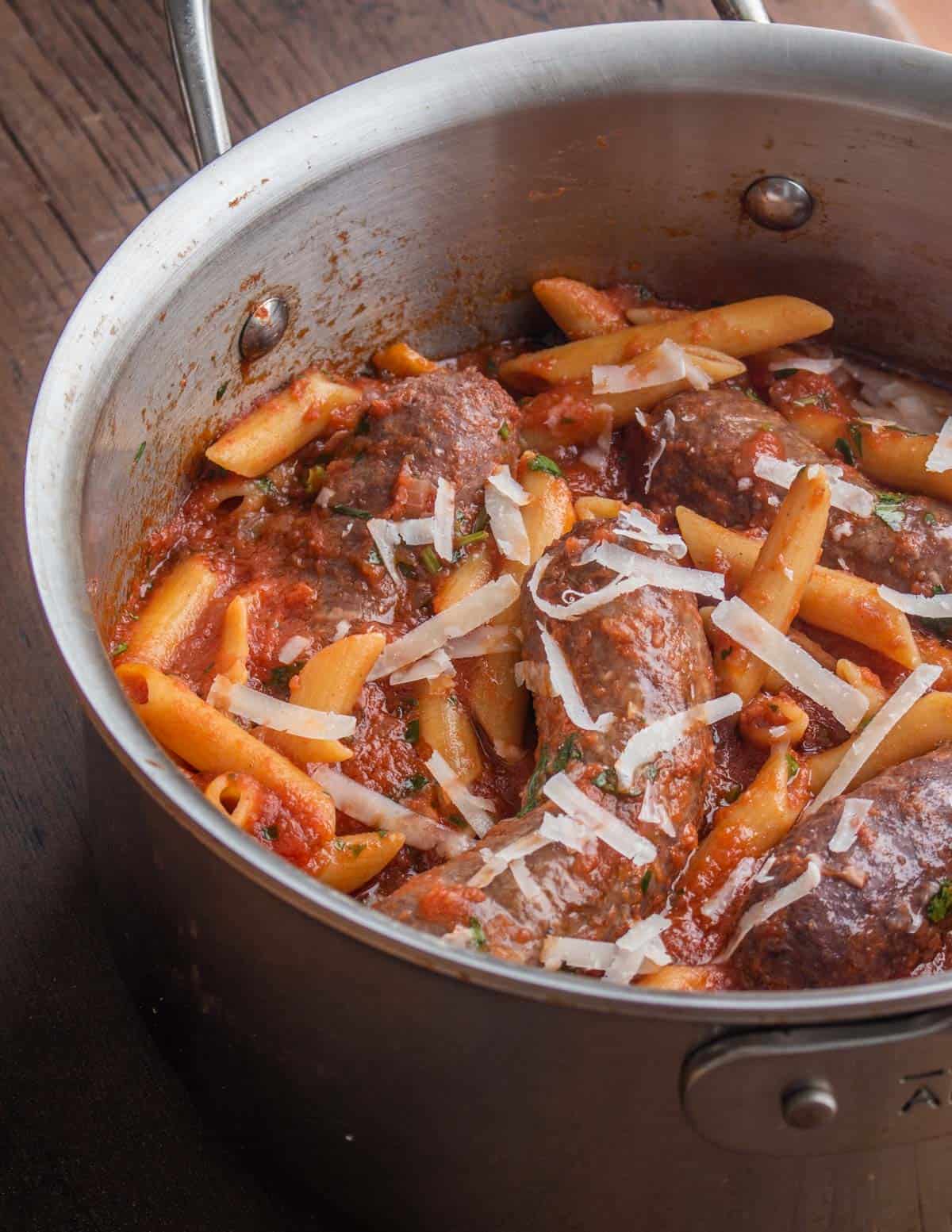 braised venison italian sausages with tomato and pasta