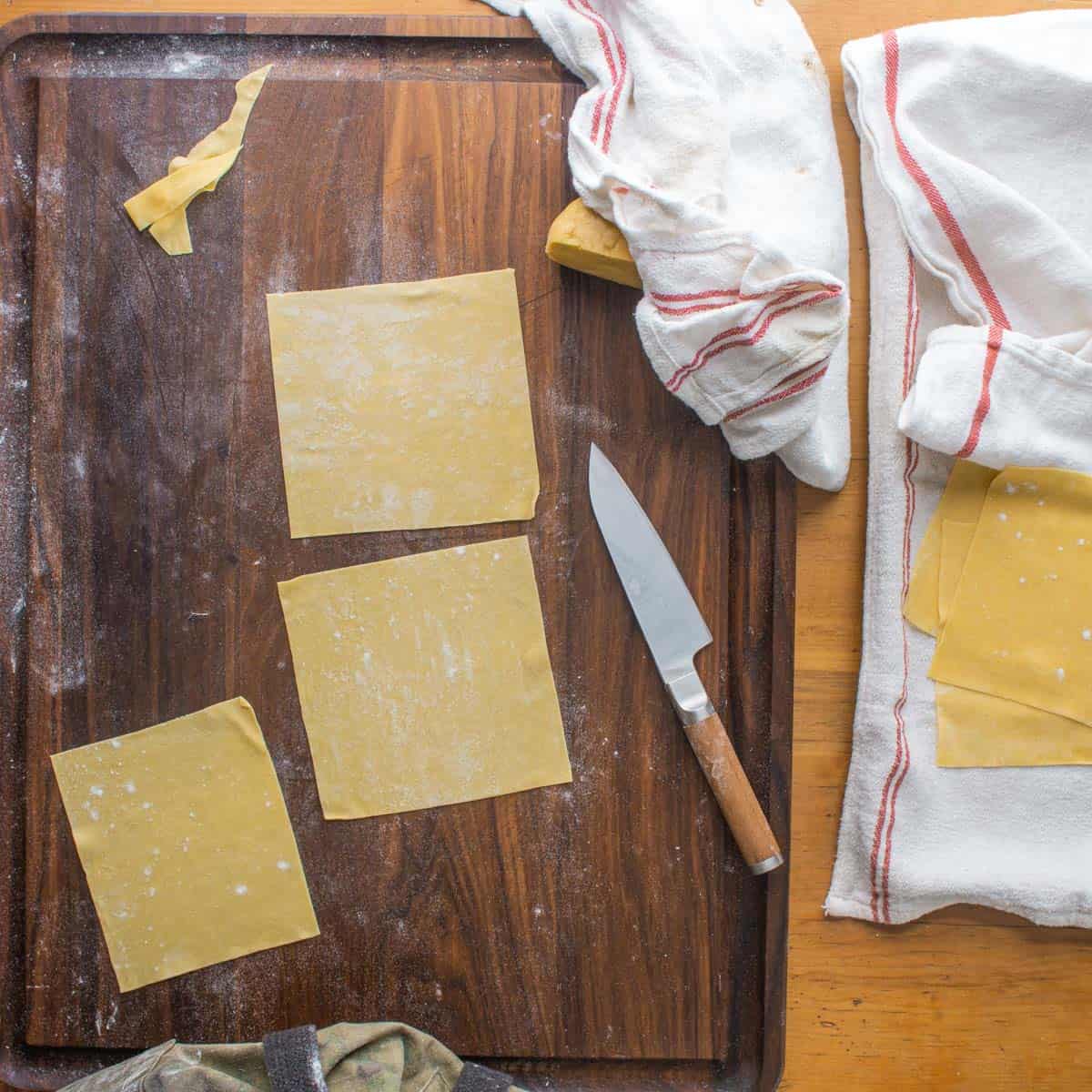 cutting pasta sheets into squares