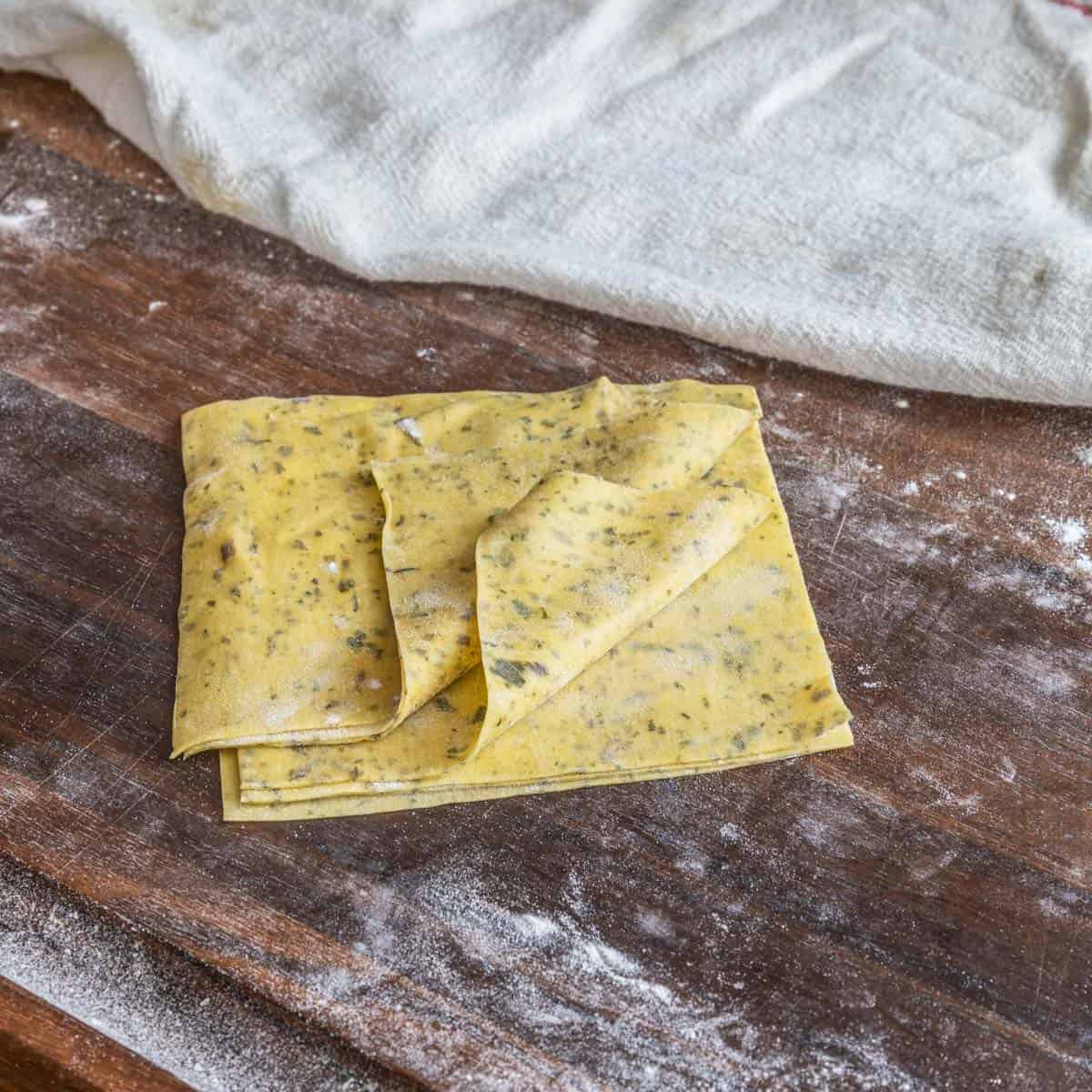 a stack of pasta squares showing different layers 