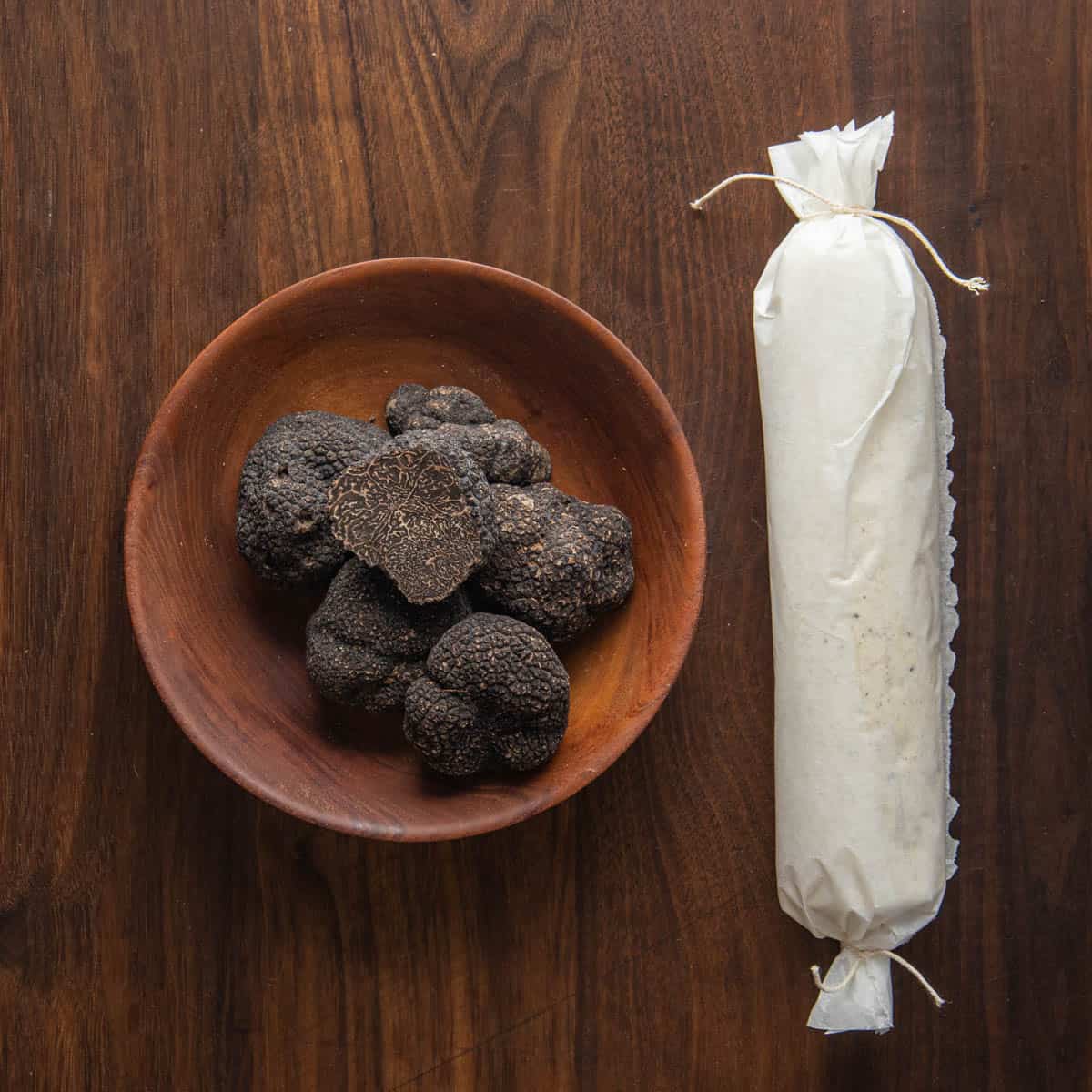 a log of truffle butter wrapped in parchment