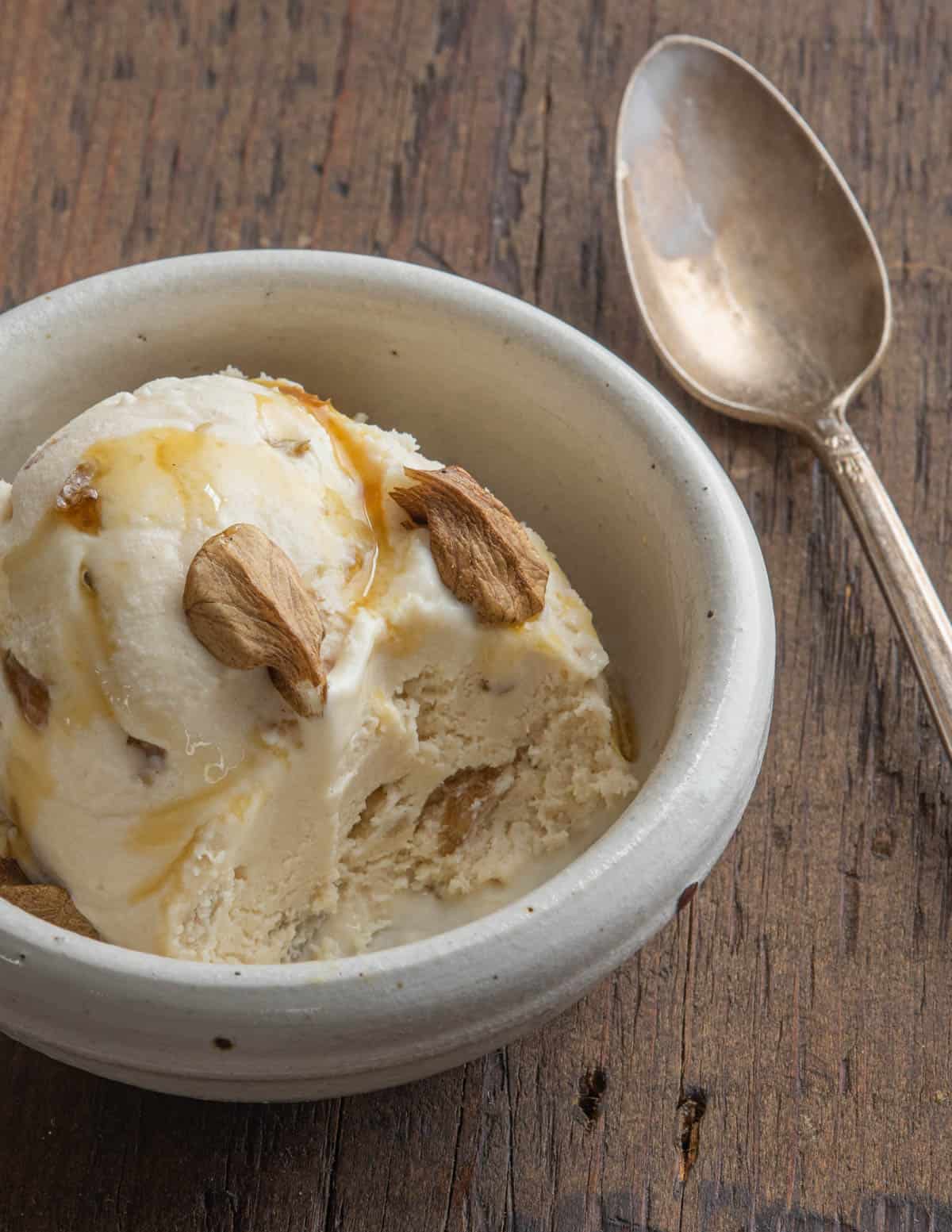 a cup of black walnut ice cream with butternuts 
