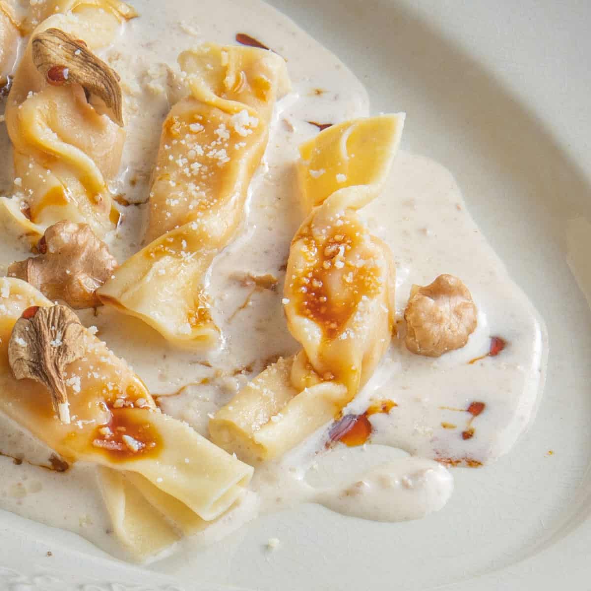 Caramelle pasta with walnut sauce and birch syrup