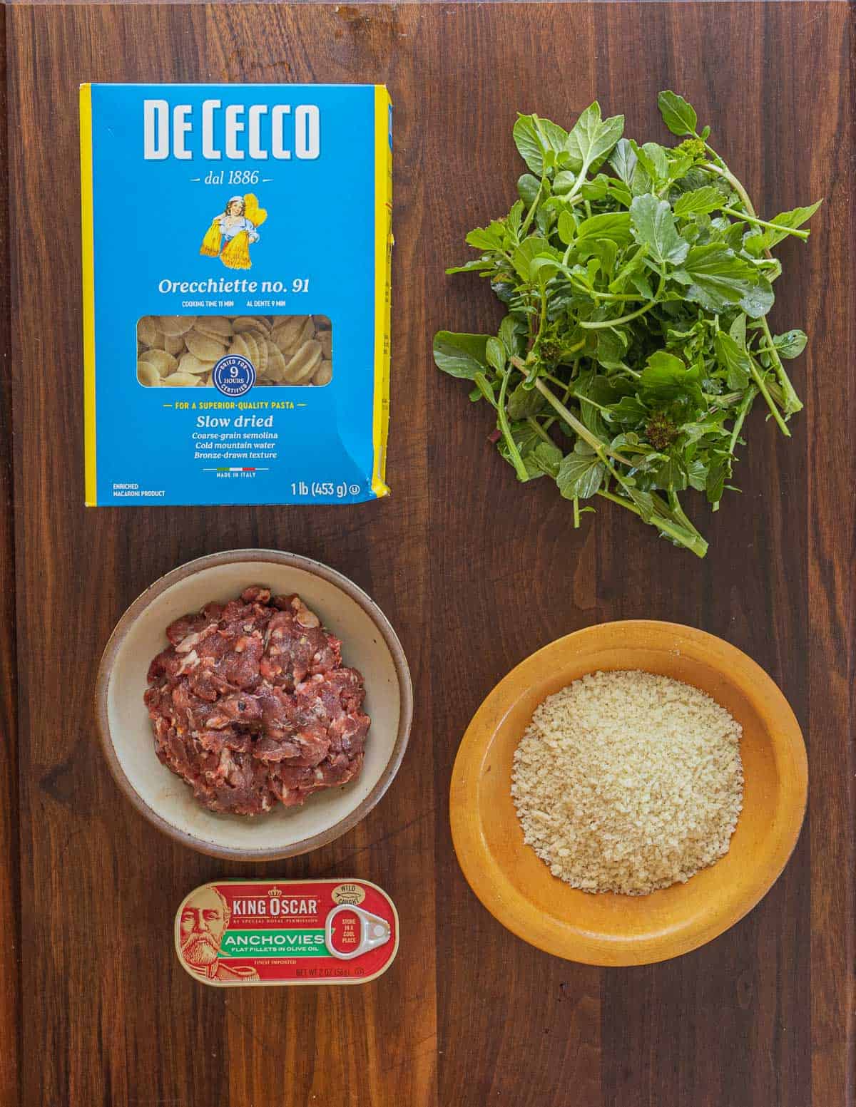 Orechiette alla barese ingredients: pasta, rapini, sausage, panko breadcrumbs, anchovy.