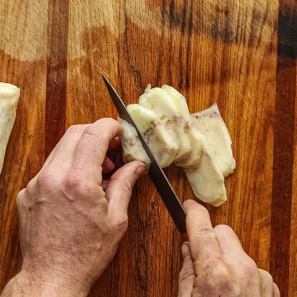 Slicing a bull thistle crown. 