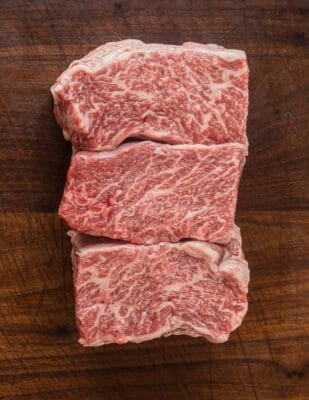 Close up image of a wagyu bavette steak showing marbling. 