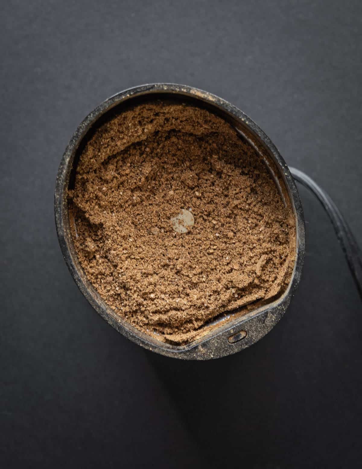 Ground, roasted linden seed powder in a coffee grinder. 