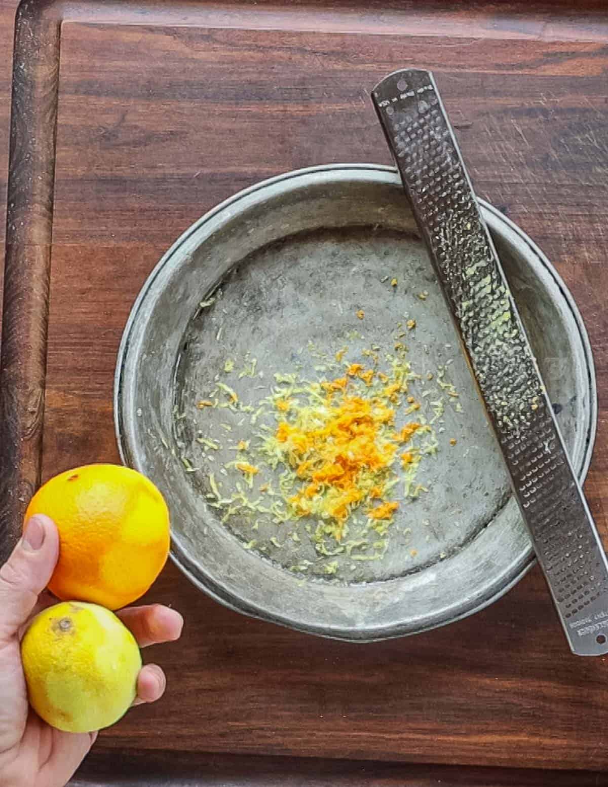 Zesting an orange and a lemon. 