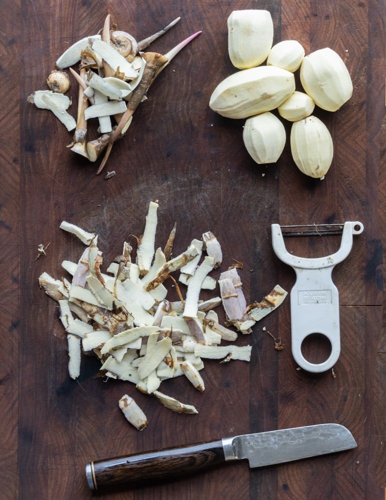 Peeling katniss potatoes with a Kuhn Rikon peeler. 