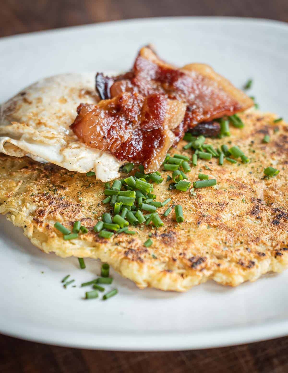 Grated wapato hashbrowns with chives, guanciale, and a fried egg. 