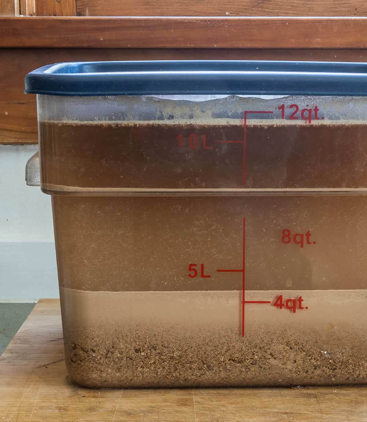 A large container of acorn flour leaching in water.