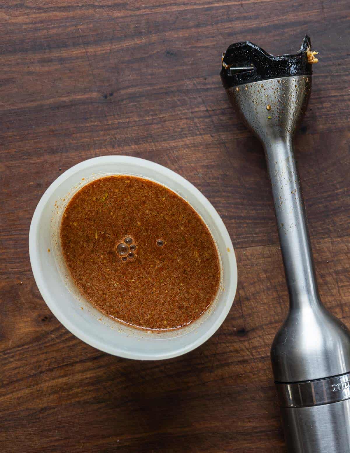 Pureeing the marinade ingredients for jerky using a handblender. 