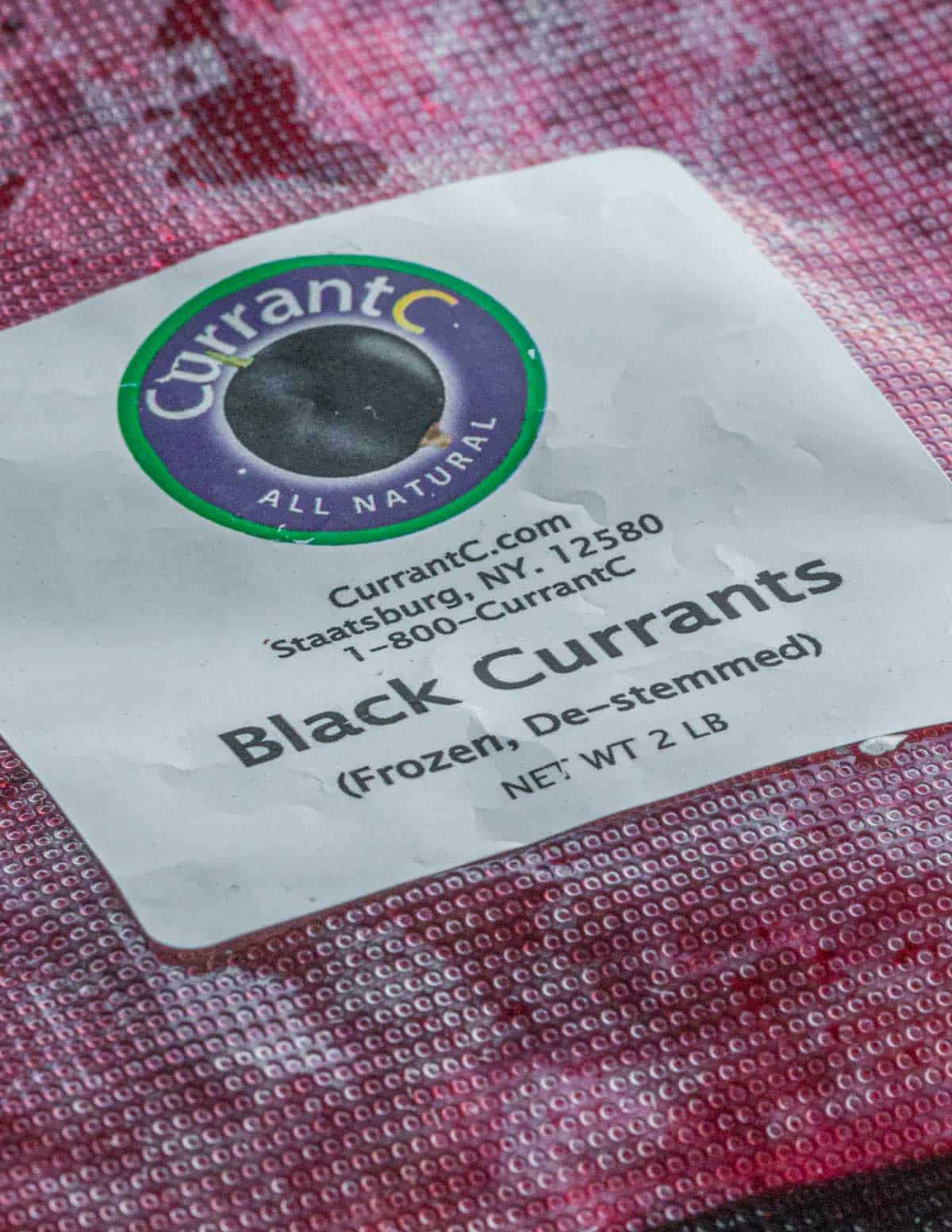A bag of frozen black currants. 