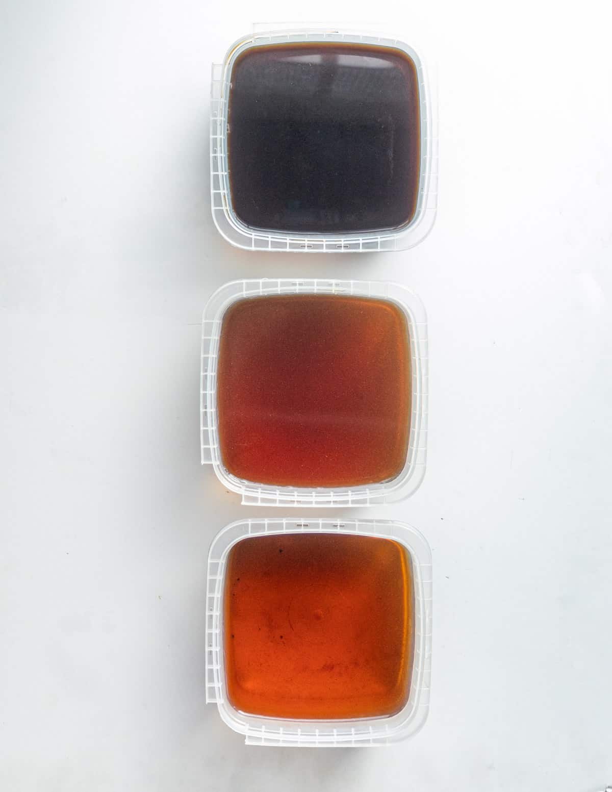 Three different batches of chaga tea made from the same chunk of chaga. 