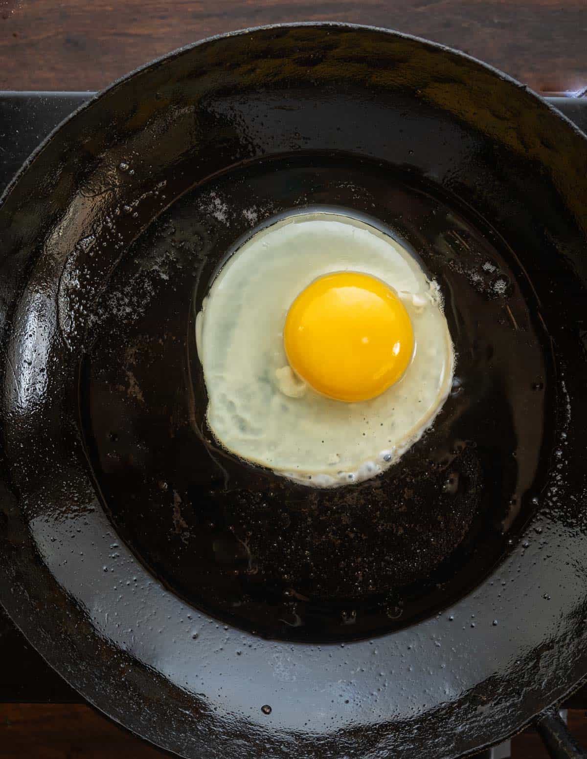 Cooking a perfect sunny side up egg.