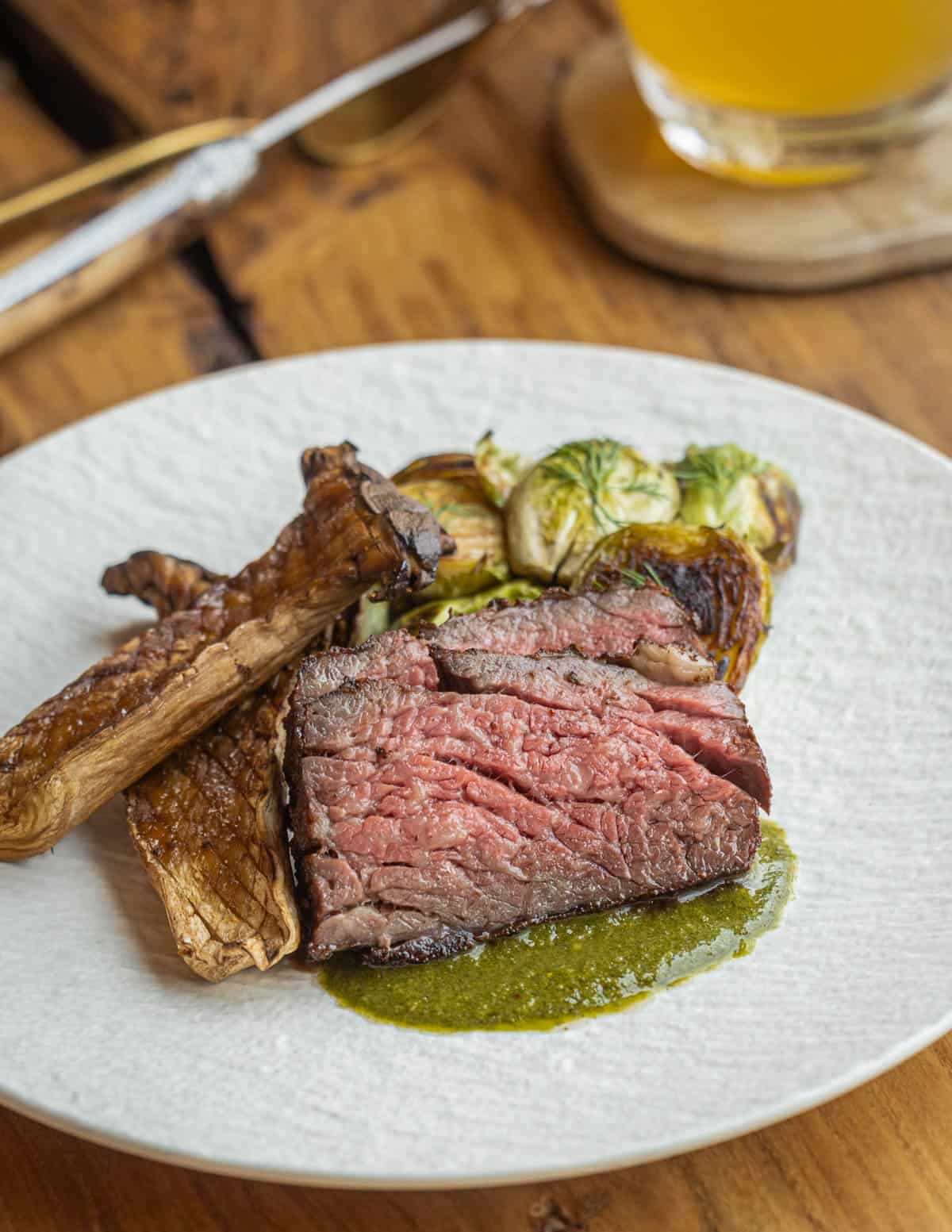Grilled king oyster mushrooms and bavette steak with chimmichurri sauce.