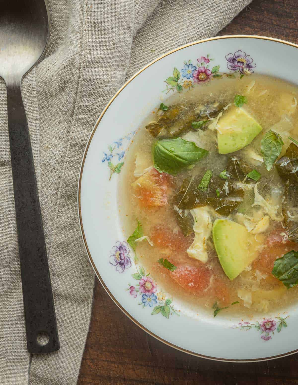 A bowl of Salvadorean sopa de mora or nightshade soup. 