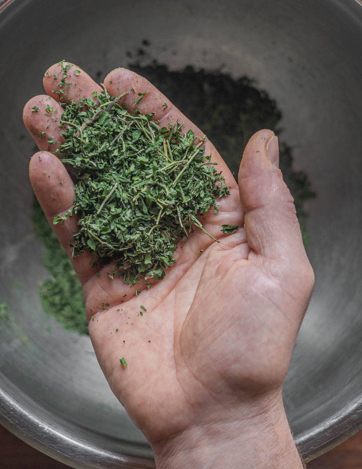 A handful of dried nettle leaf tea ready for storing. 