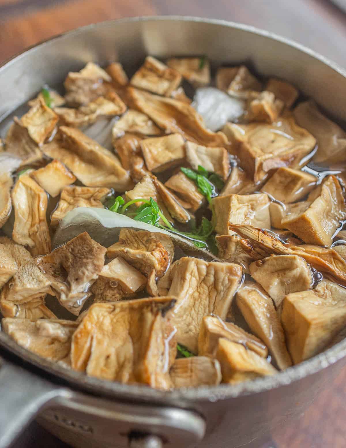 Making mushroom broth from dried berkeley's polypore. 