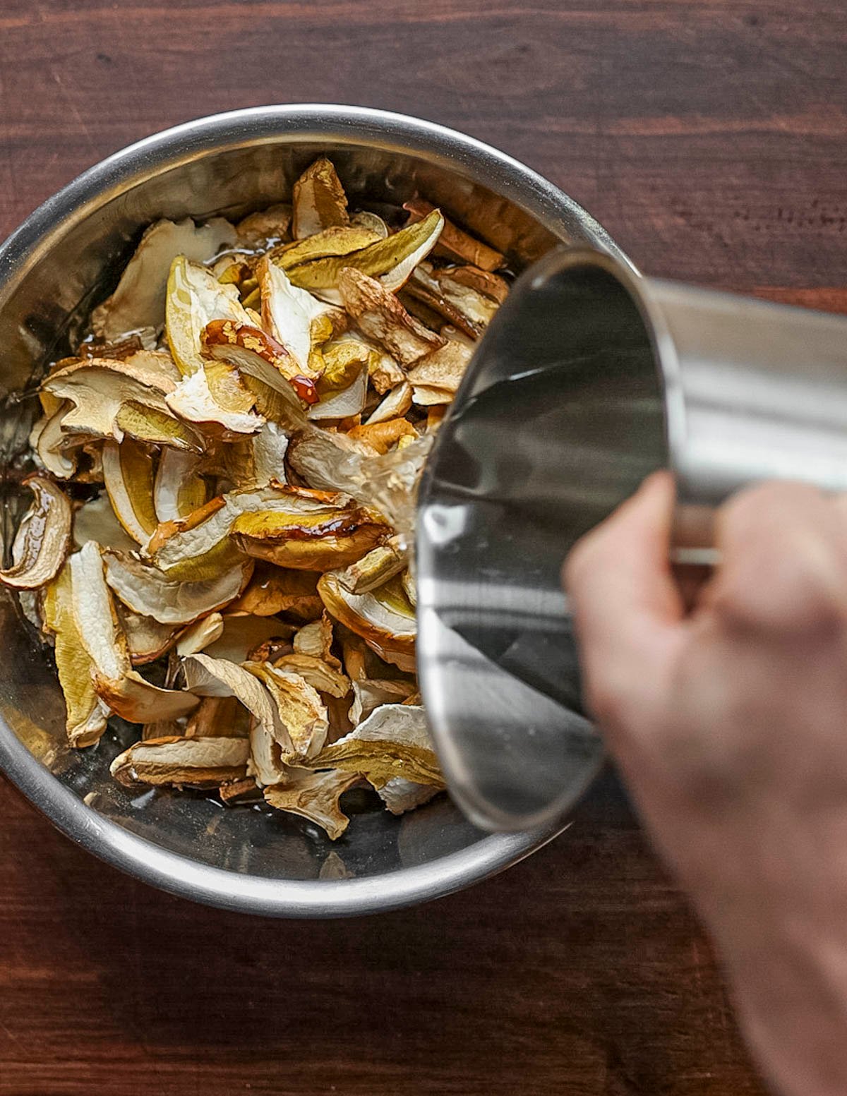 Soaking dried porcini mushrooms in water. 