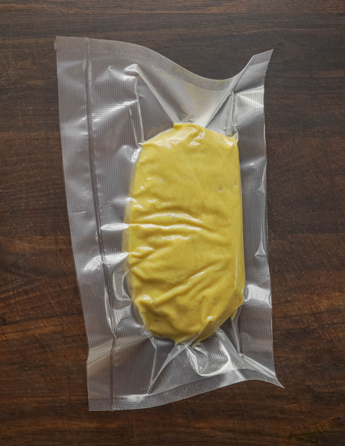 Vacuum sealing pasta dough for improved hydration. 