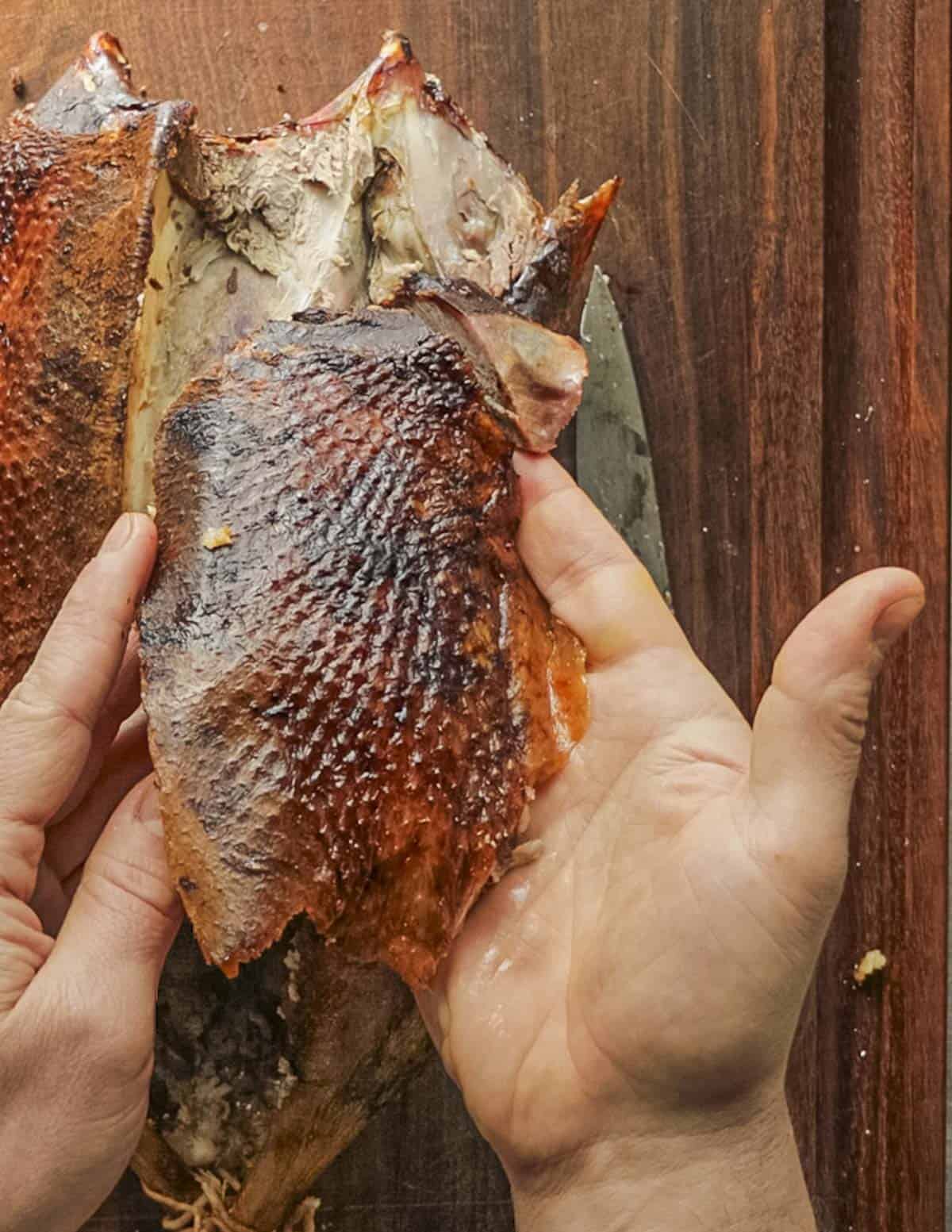 A whole roasted goose breast. 