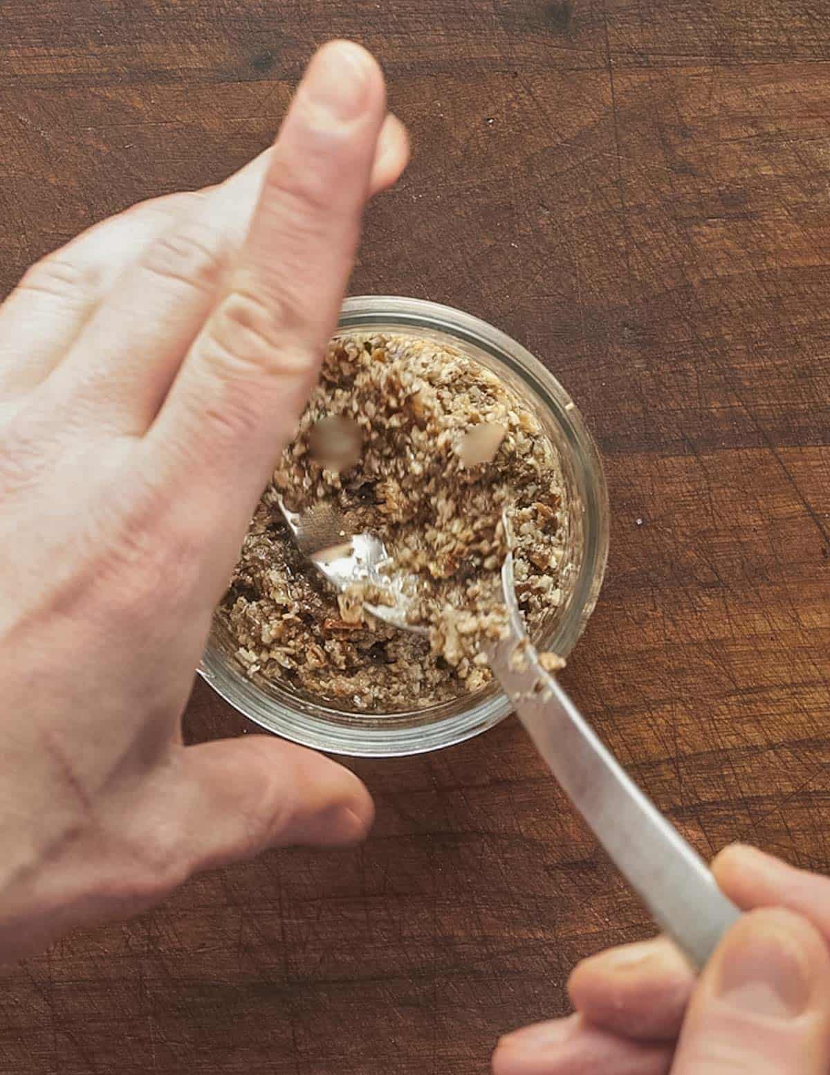 Packing a pint jar full of mushroom tartufata sauce. 