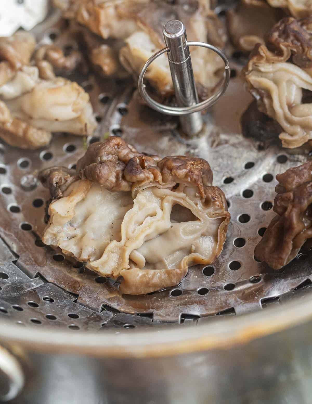 Steaming mushrooms to par cook them. 