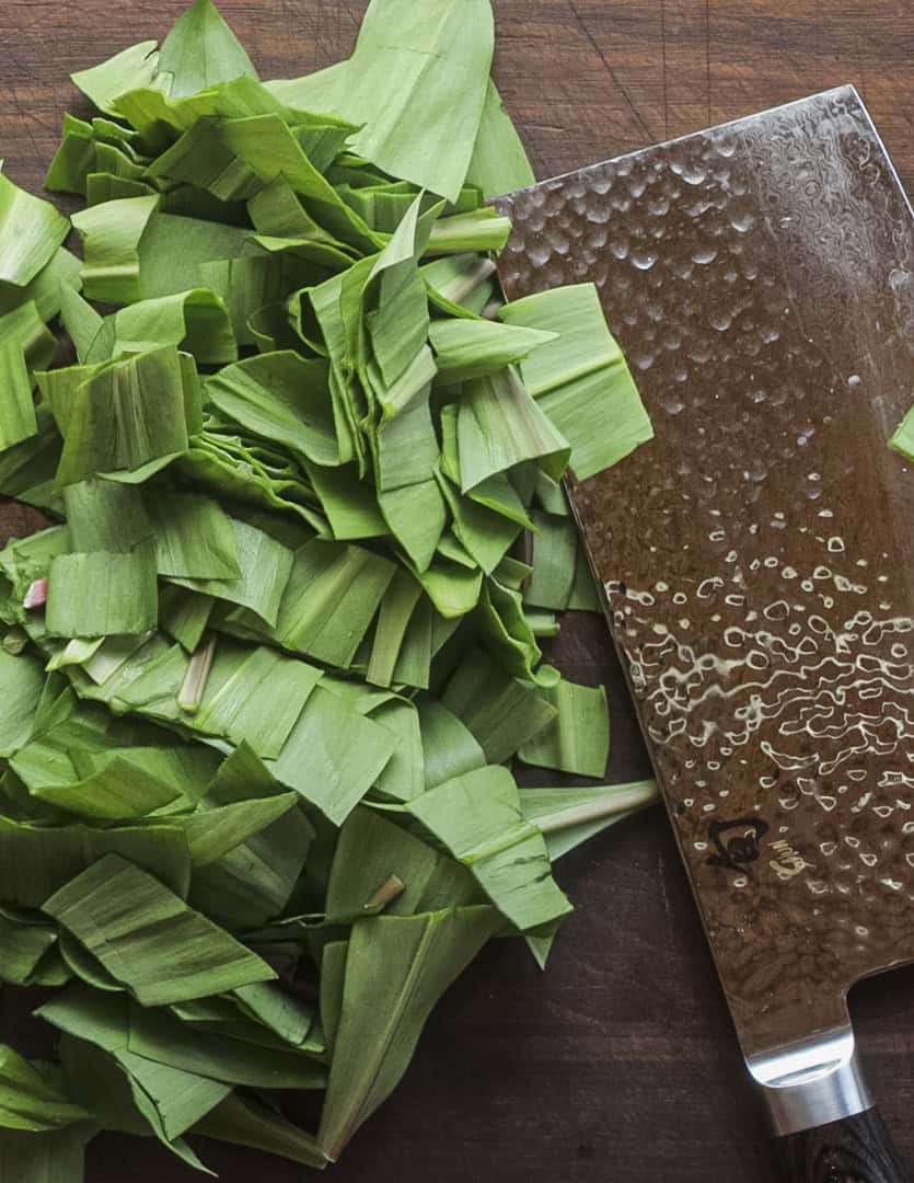 Slicing wild ramp leaves with a Japanese chef knife. 