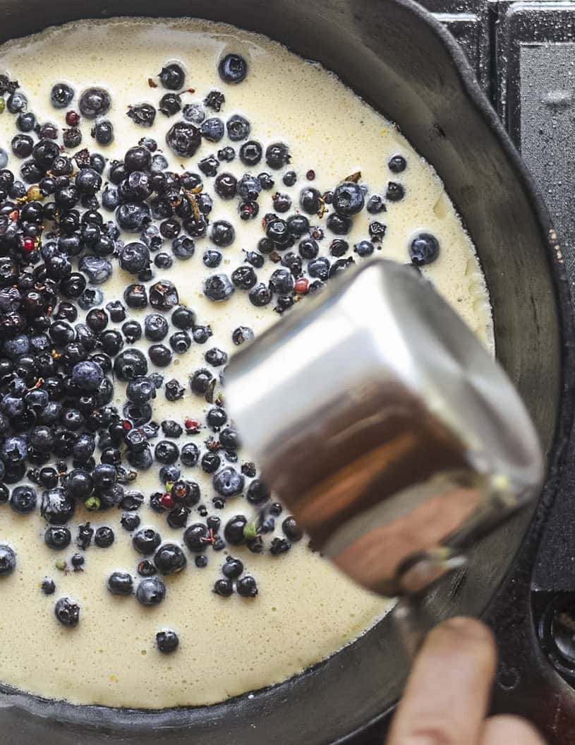 Add the blueberries to the pan. 