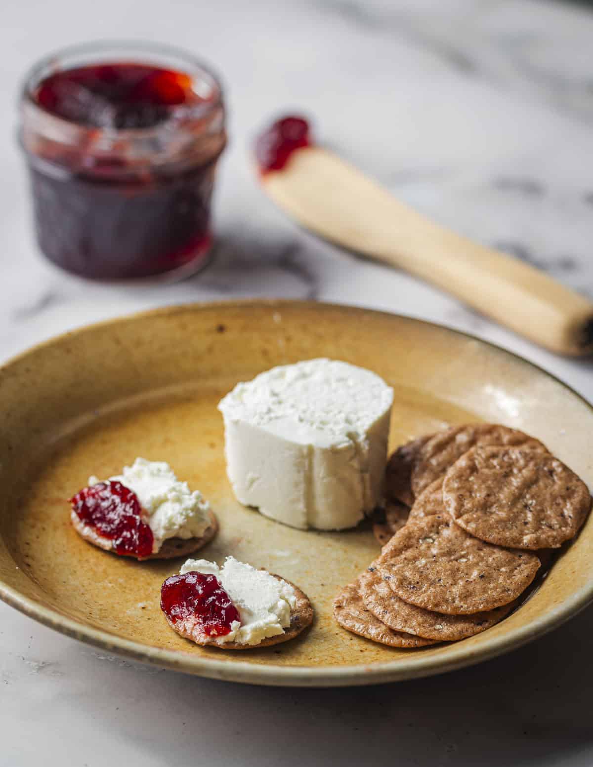 Habanero highbush cranberry jelly served with goat cheese and crackers. 