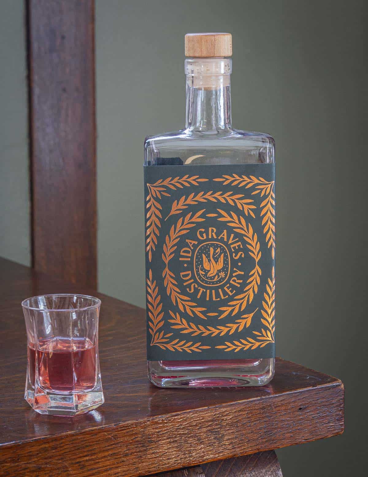 A bottle of highbush cranberry liqueur made by chef alan bergo and Ida Graves  Distillery. 