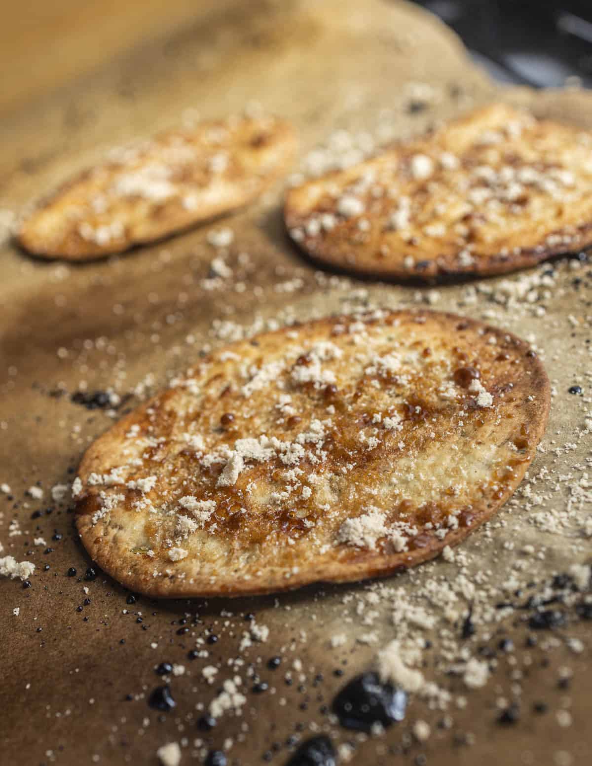 Spanish tortas de aceite made with fennel seeds and maple sugar.