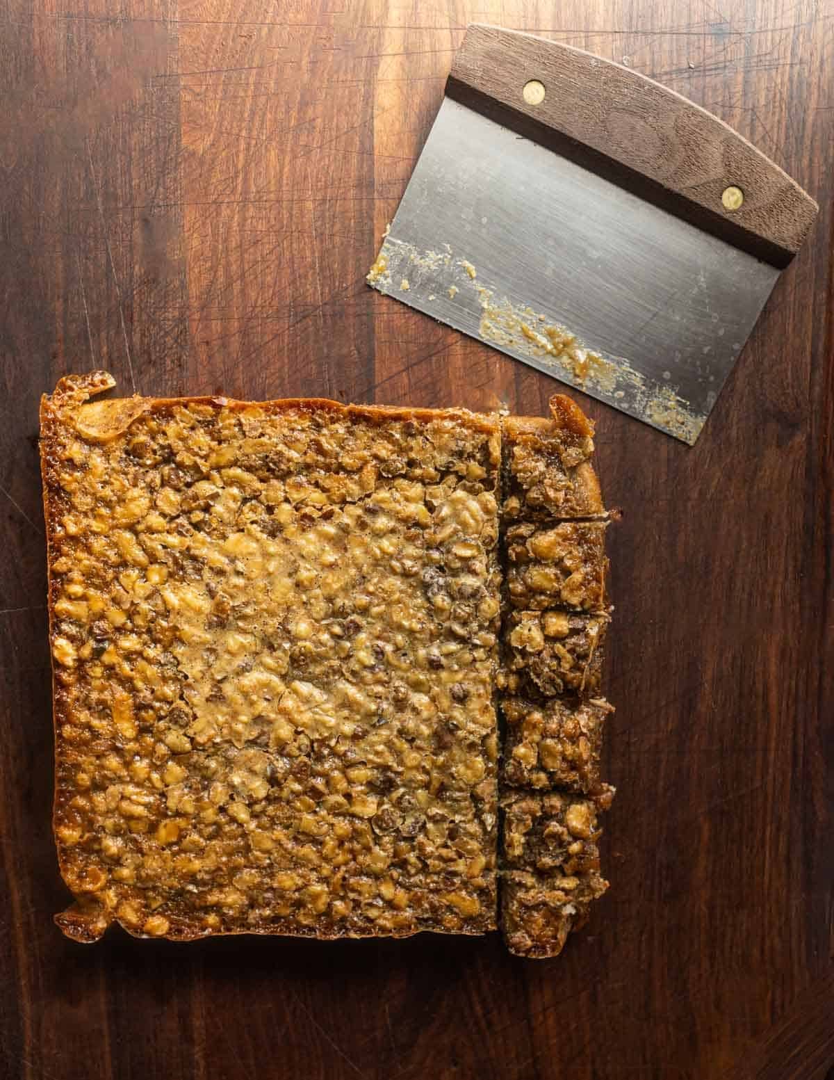 Cutting bar cookies with a bench knife.