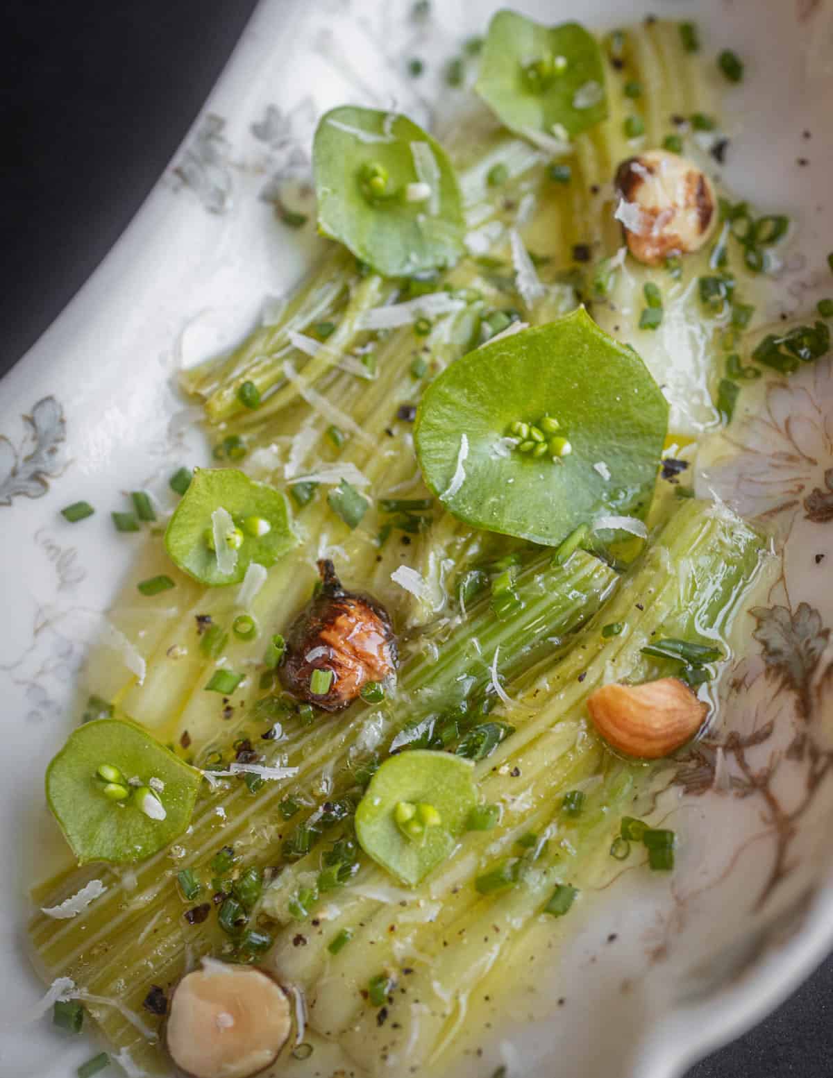 Gently cooked dock stems with miners lettuce, wild hazelnuts and herbs.