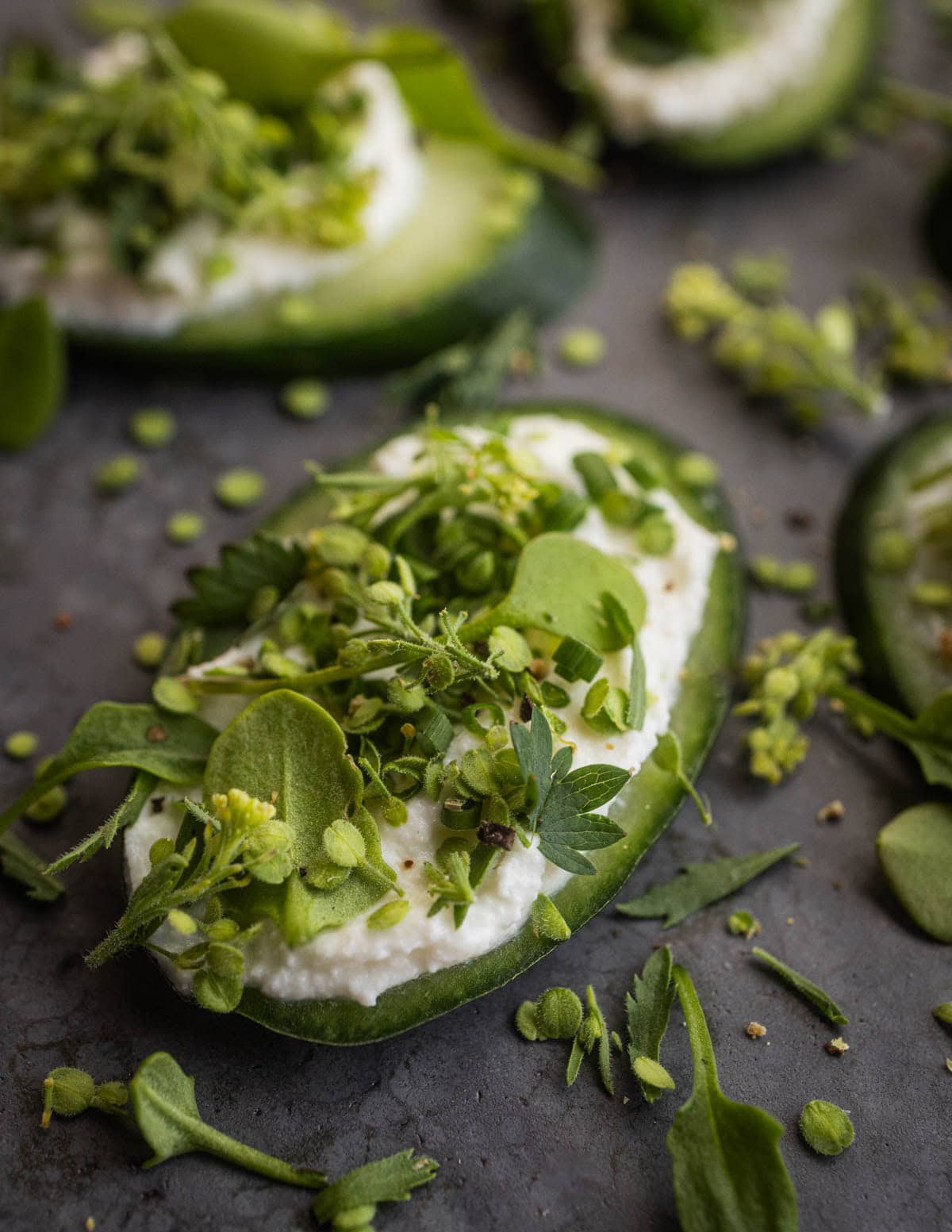 Cucumber slices with goat cheese, sheep sorrel, burnet, peppergrass seeds and miners lettuce.