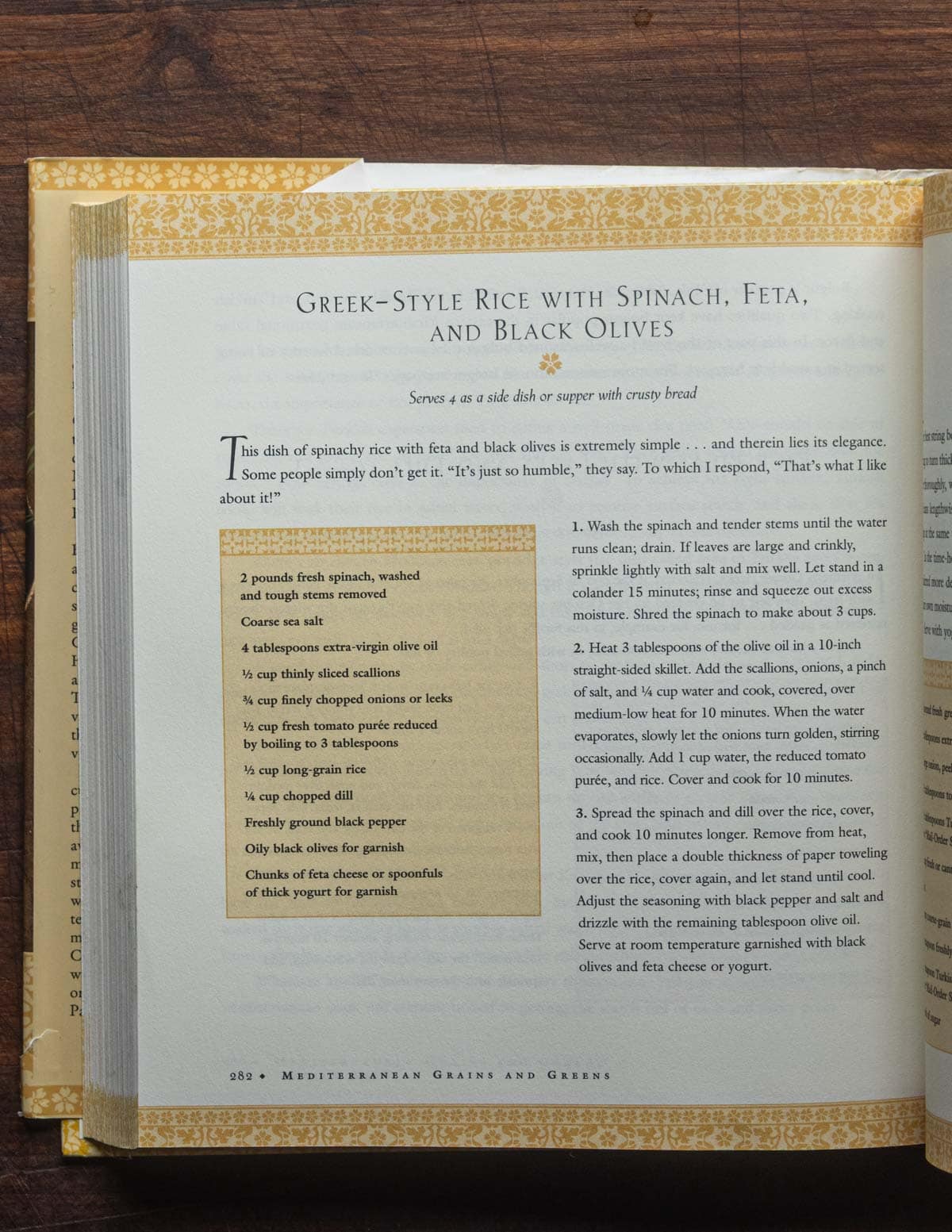 A recipe for greek rice with olives, spinach and feta cheese from "Mediterranean Greens and Grains" by Paula Wolfert.