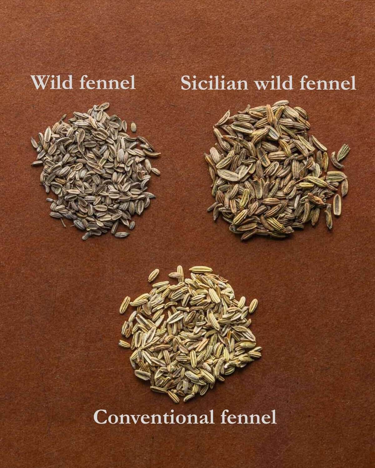 Three types of wild fennel seed on a cutting board.