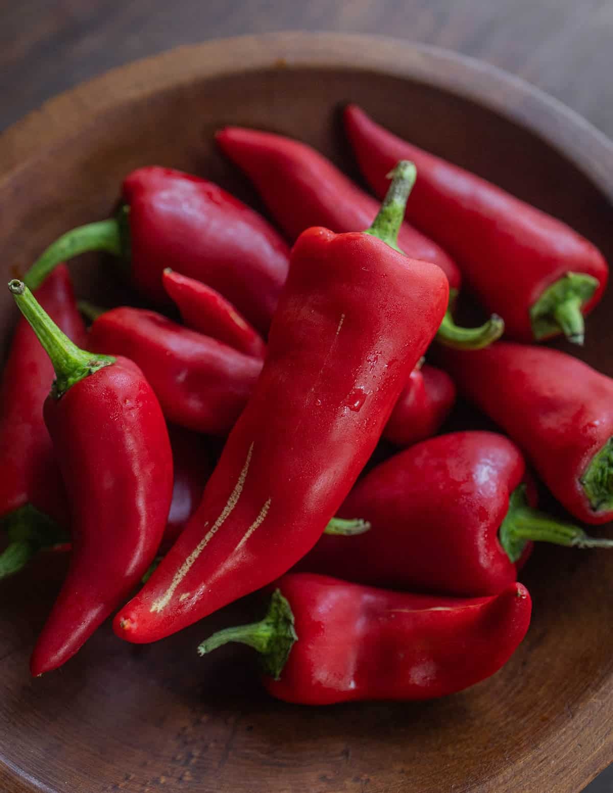 A bowl of red Fresno peppers.
